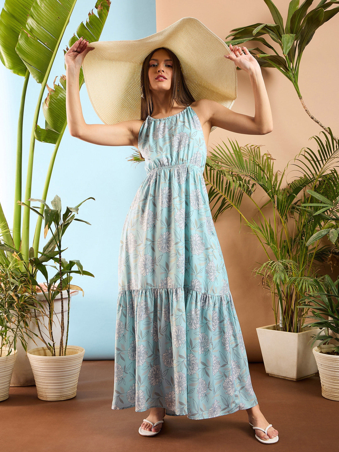 Women's Women Blue Floral Back Less Maxi Dress in Georgette by Sassafras for wholesale, bulk, supplier, manufacturer and wholesaler buyers from Trendphoria