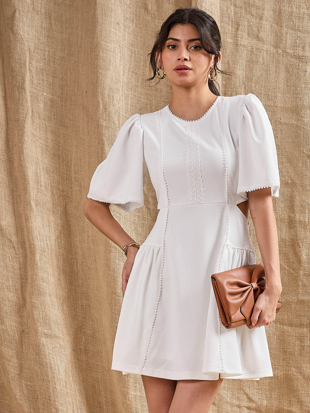 Women's Women White Side Cut Out Skater Dress in Polyester by Sassafras for wholesale, bulk, supplier, manufacturer and wholesaler buyers from Trendphoria