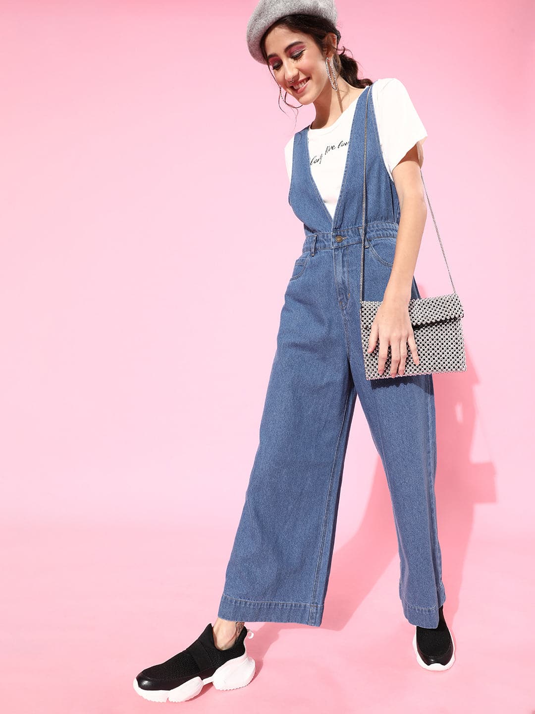 Women's Blue Deep V-Neck Denim Flared Leg Jumpsuit in Cotton by Sassafras for wholesale, bulk, supplier, manufacturer and wholesaler buyers from Trendphoria