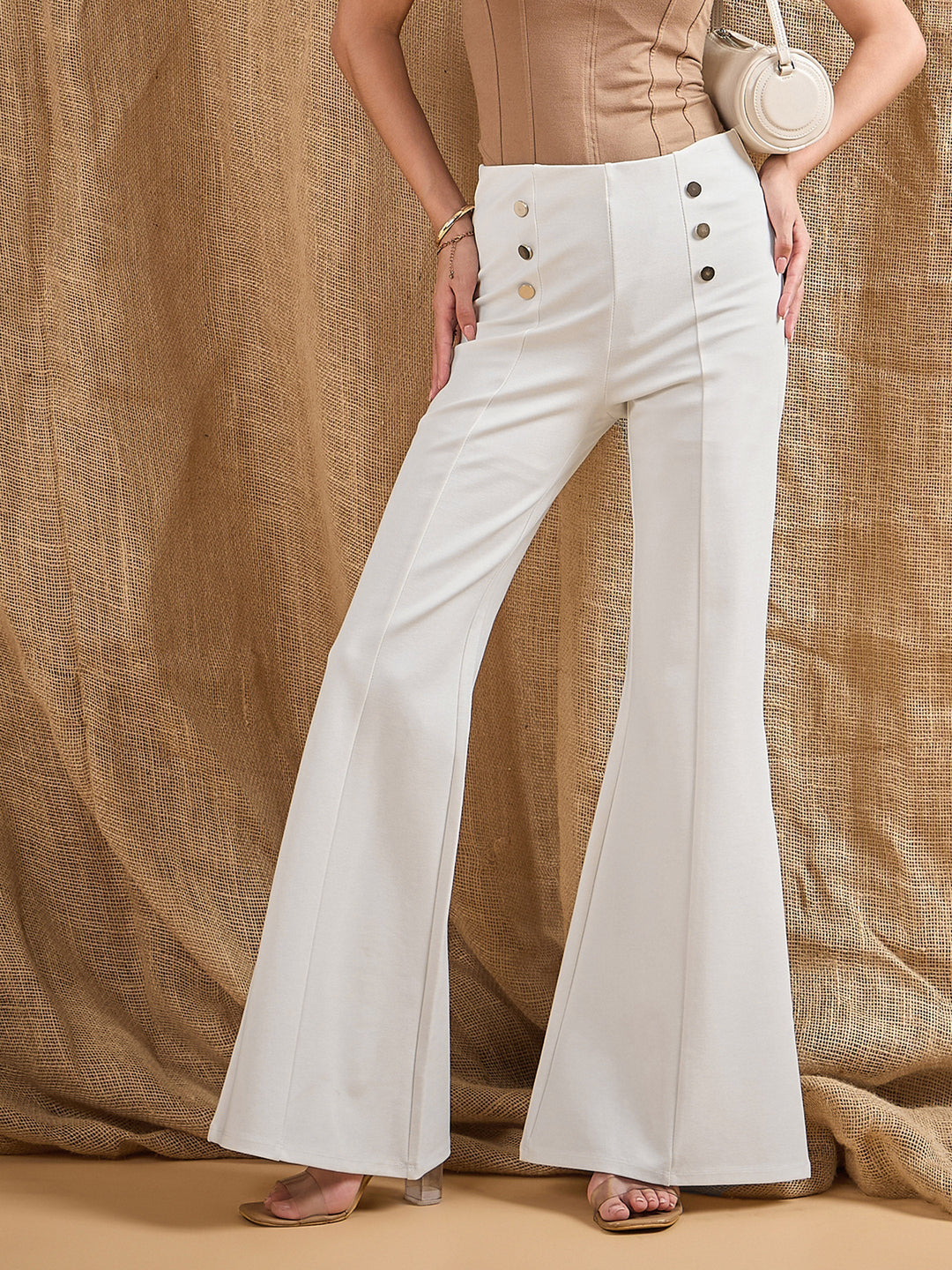 Women's Women White Front Button Flared Bell Bottom Pants in Rayon by Sassafras for wholesale, bulk, supplier, manufacturer and wholesaler buyers from Trendphoria