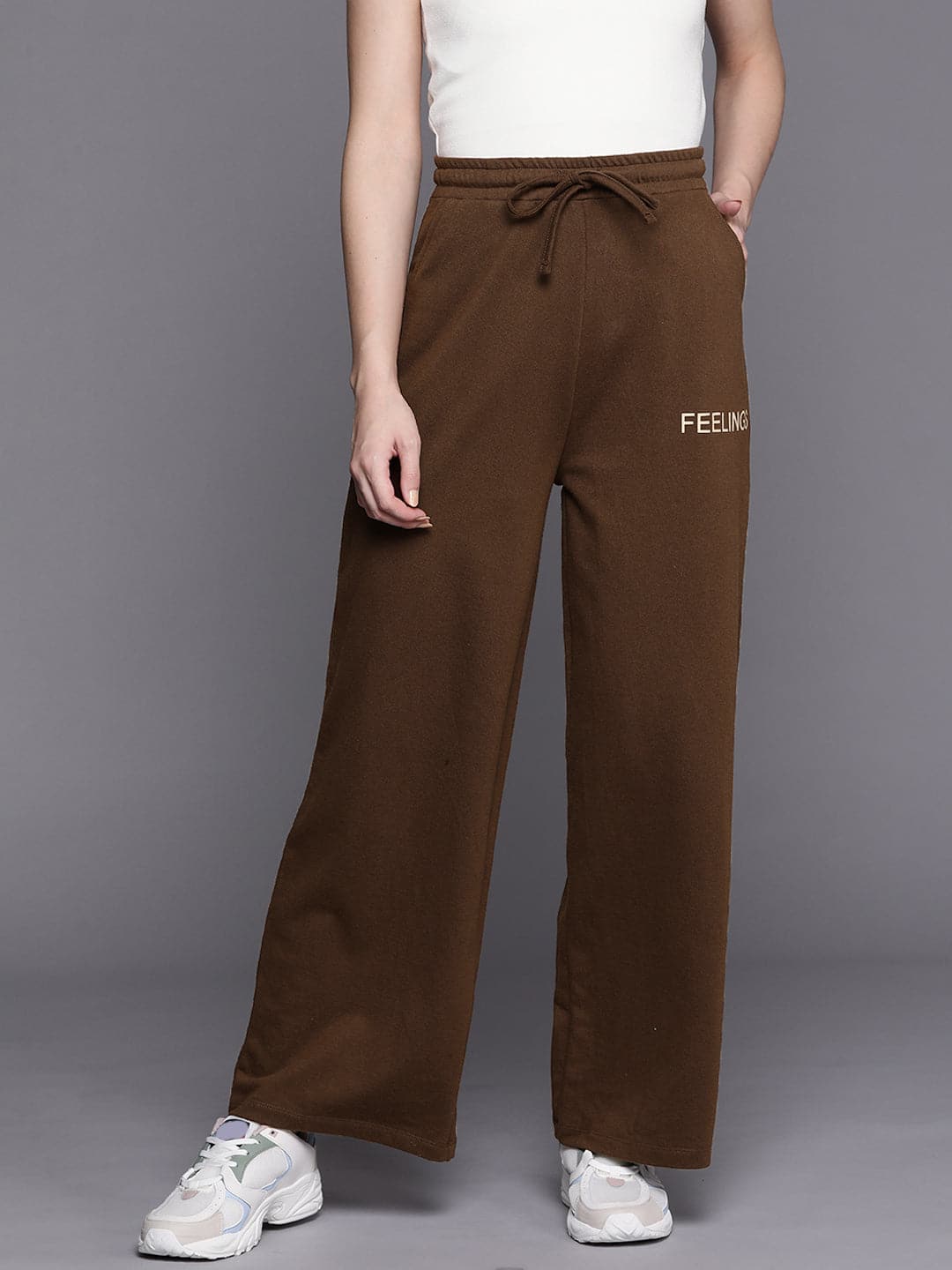 Women's Women Brown FEELING Track Pants in Cotton by Sassafras for wholesale, bulk, supplier, manufacturer and wholesaler buyers from Trendphoria