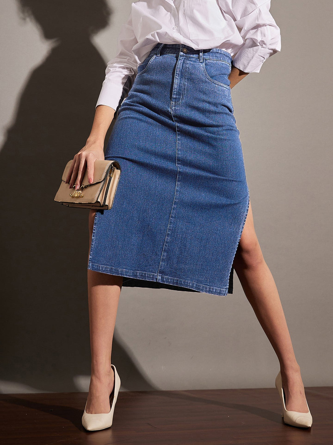 Women's Women Ice Blue Denim Side Slit Midi Skirt in Cotton by Sassafras for wholesale, bulk, supplier, manufacturer and wholesaler buyers from Trendphoria