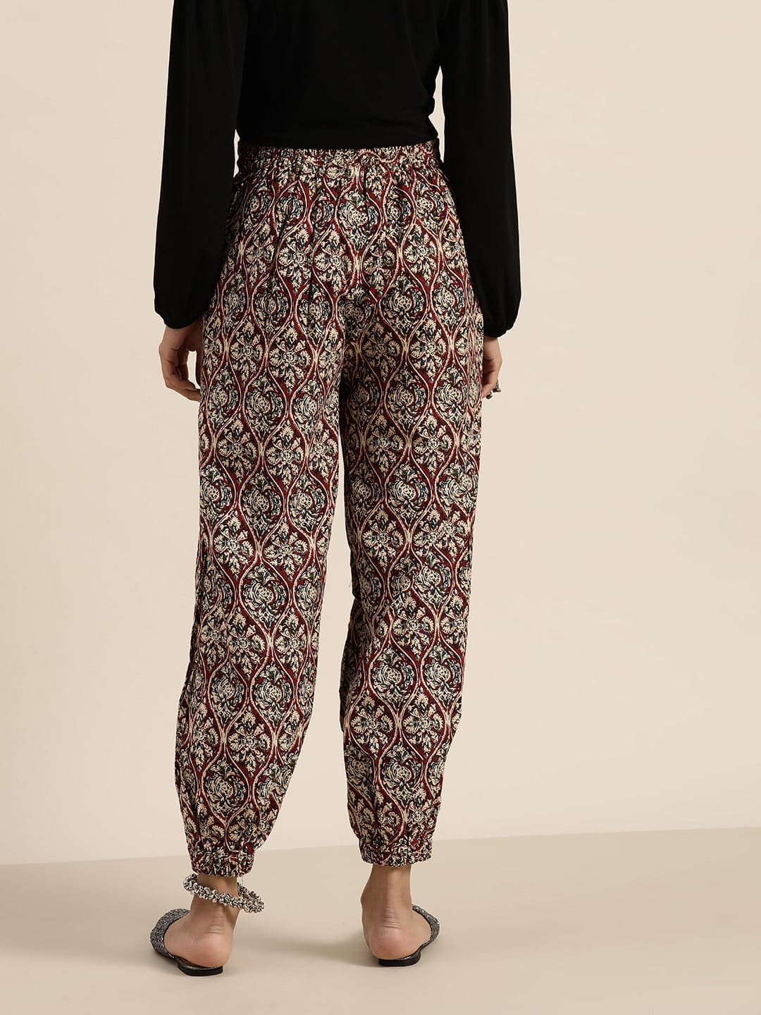 Women's Chocolate Brown Floral Cuffed Pants in Cotton by Shae for wholesale, bulk, supplier, manufacturer and wholesaler buyers from Trendphoria